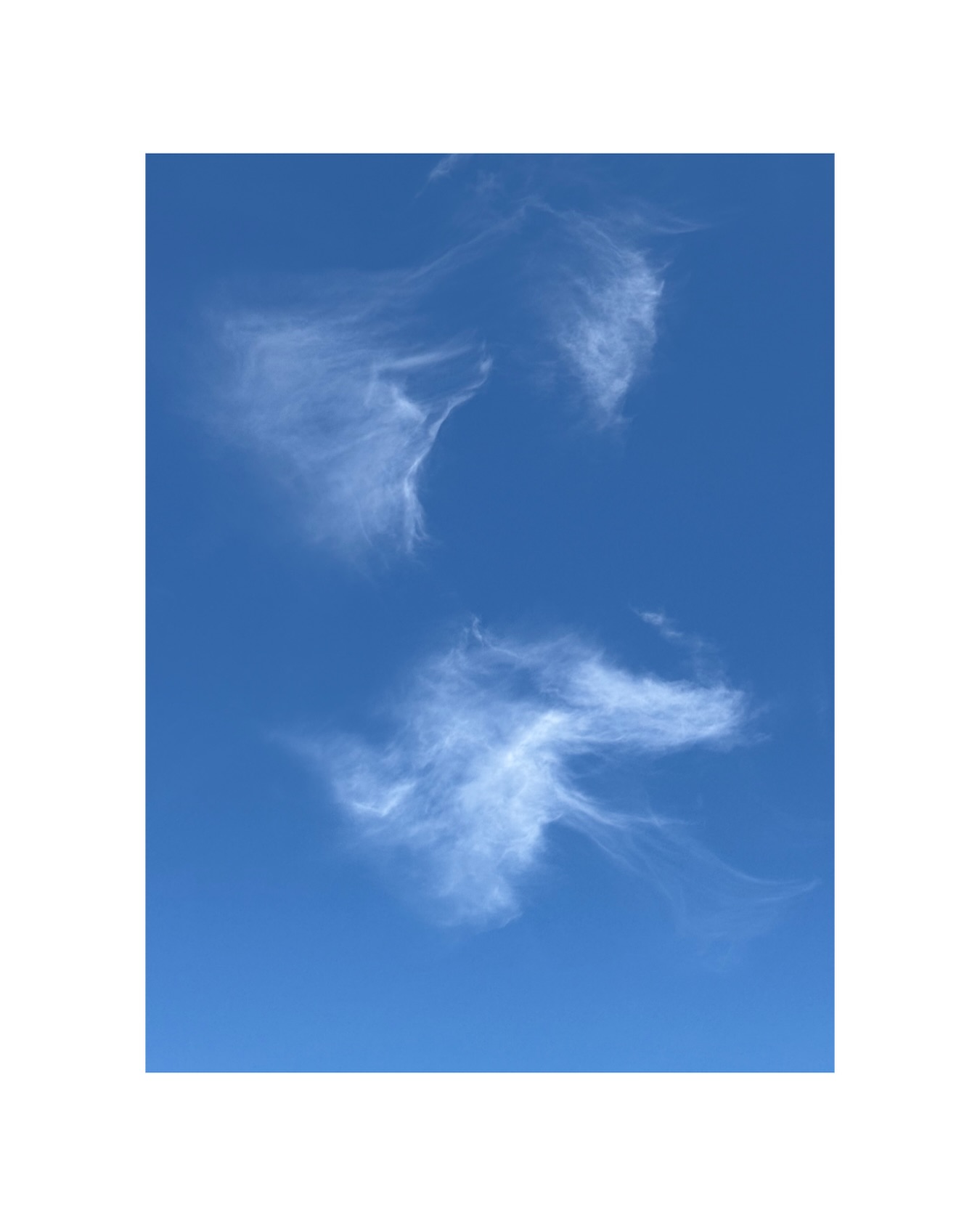 cloud whispers while the sea listens